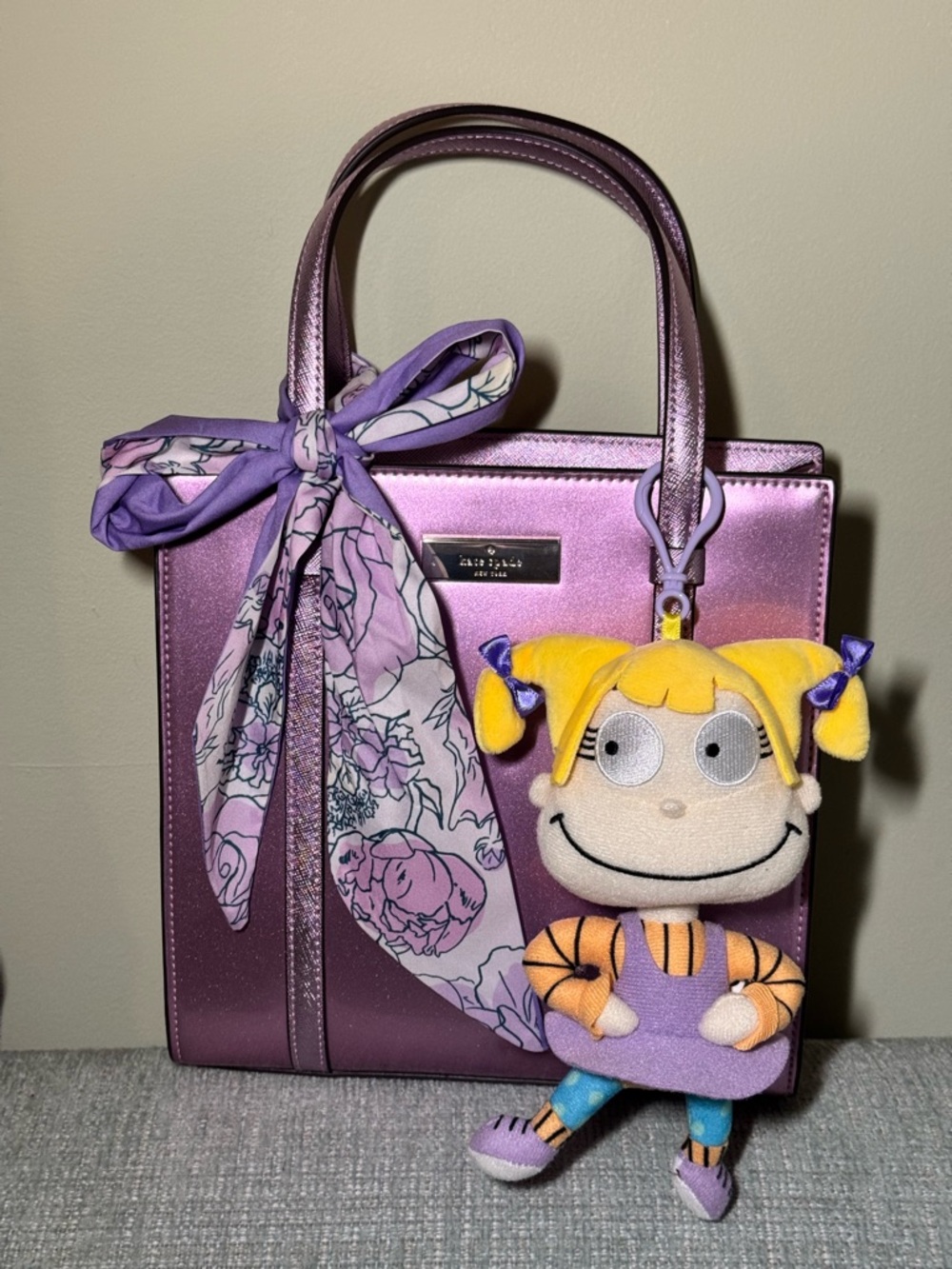 kate spade metallic lavender tote with floral scarf and blonde doll charm